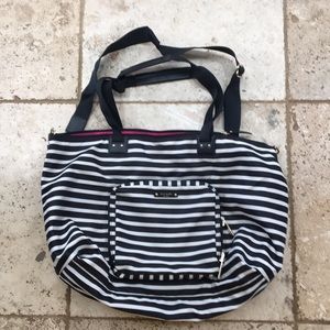 Cute Kate Spade purse in a pouch